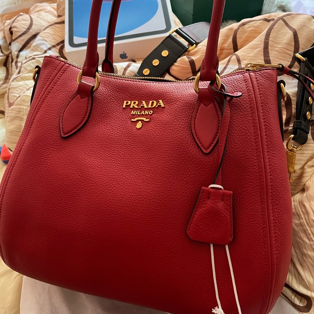 Brand new Prada bag never worn . Can fit anything good for going to the office